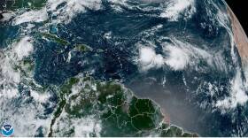 Friday morning satellite imagery reveals that tropical Storms Philippe and Rina are less than 500 miles from each other.