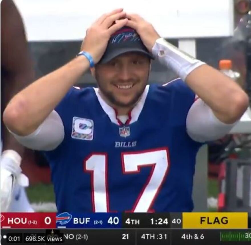 Josh Allen puts his hands on his head in apparent disbelief of the 4th-quarter score.