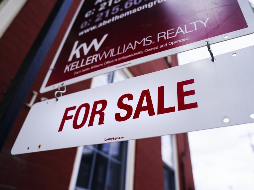 A for sale sign is posted on a home in Philadelphia, Tuesday, Jan. 18, 2022. (AP Photo/Matt Rourke)