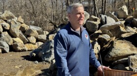 Gov. Josh Stein speaks alongside the French Broad River in Woodfin on Feb. 16, 2026.