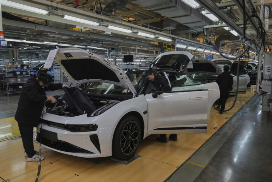 Workers assemble the Zeekr 001 EV models at the Chinese automaker Zeekr assembly plant, in Ningbo, east China's Zhejiang Province, Wednesday, April 17, 2025. (Andy Wong/AP)