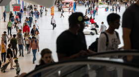 People walk and shop in a lower Manhattan shopping mall on September 13, 2023 in New York City. Newly released numbers by the Labor Department’s consumer price index show that August inflation came in higher than expected, rising 3.7% on a 12-month basis. (Photo by Spencer Platt/Getty Images)