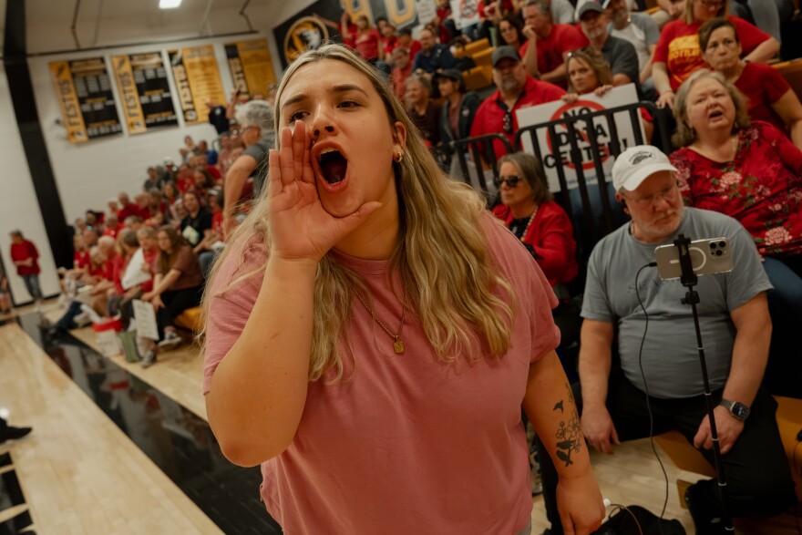 "Cowards!" yells MacKenzie Merriman after the Festus City Council pushed to pass a plan to develop a large-scale data center in the community on Monday night in Festus.
