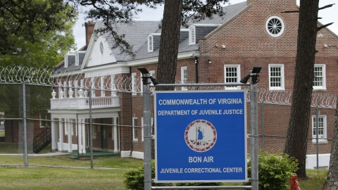 Security fences surround buildings at The Bon Air Juvenile Correctional Center on Tuesday April 21, 2020, in Bon Air, Va. 