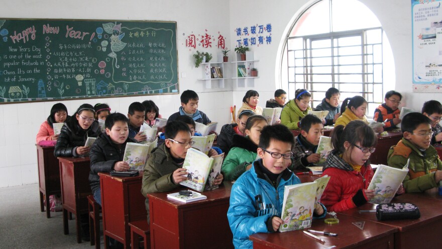 A number of the students at the Yangkou Township Elementary School face difficulties at home, where many of them are being raised by grandparents after their parents have gone to the cities seeking work.