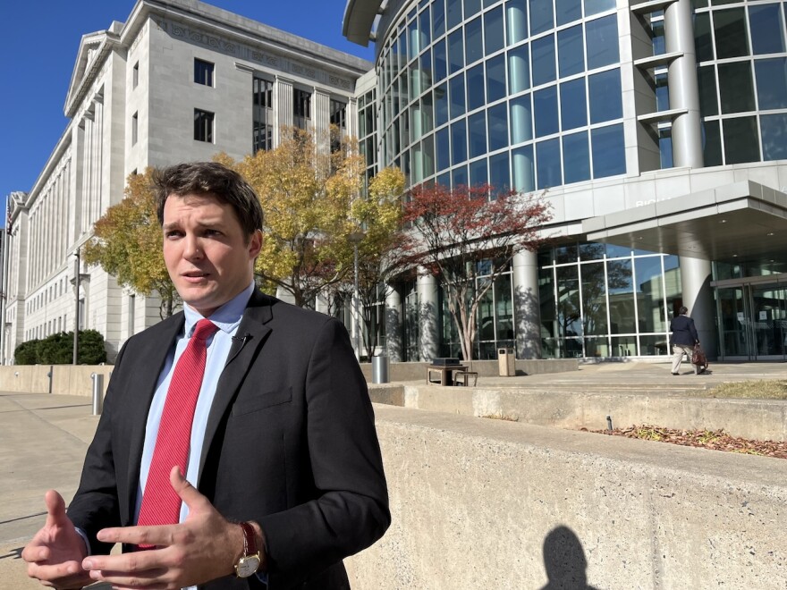John Cusick, assistant counsel with the Legal Defense Fund, talks with reporters outside of the federal courthouse in Little Rock on Dec. 2, 2024.