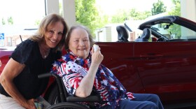 Assisted living resident Elaine Wirth after her cruise around town in a red convertible Mustang.