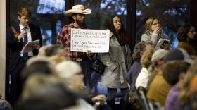 An opponent of a planned pipeline through the Hill Country listens during a community meeting in Wimberley in January. 