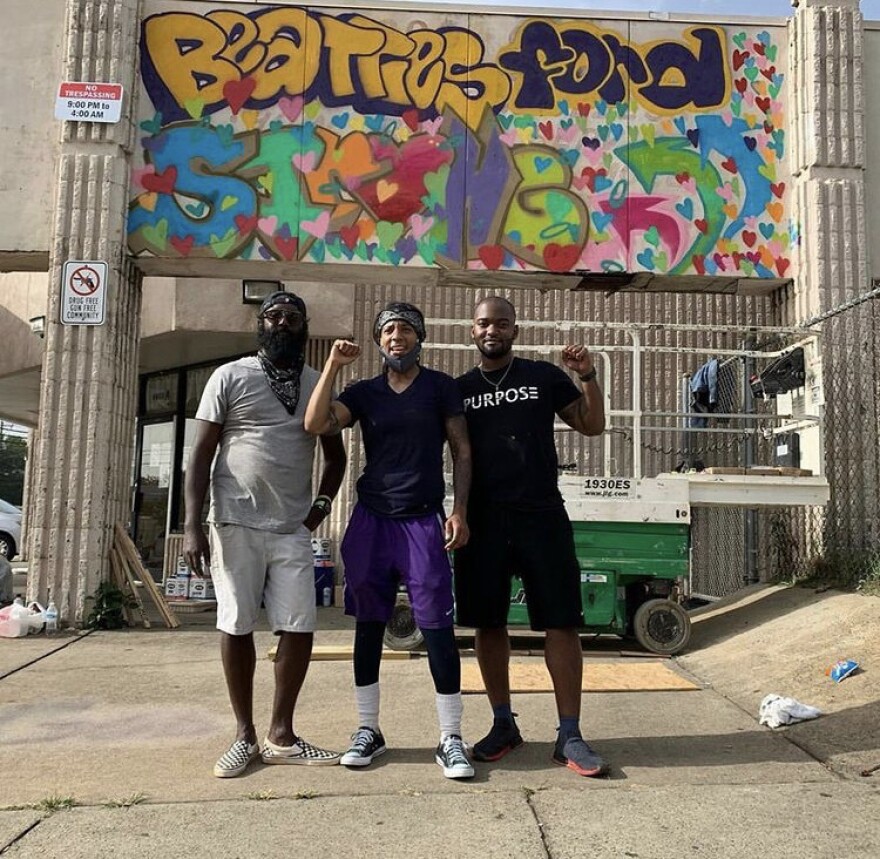 In June of 2020 days after the shooting, artist Ricky Singh and others worked to paint this first mural near the scene of the incident to honor the victims. It started a movement to bring beauty and community to the west side.