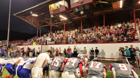 All Star football players from Ashland and Phoenix high schools join all stars from Japan in greeting the crowd at Ashland High School after the 2025 Pacific Rim Bowl football game on July 25, 2025.