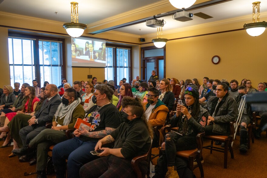 People packed a legislative committee room on Jan. 23, 2025 to speak on a bill that would restrict what on-campus housing transgender people can live in while attending a state college or university.