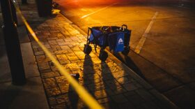 Police and emergency personnel work on a crime scene in Waukesha, Wisconsin.