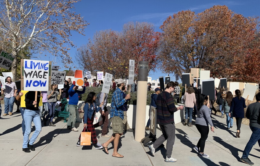NMSU graduate students and supporters picketing
