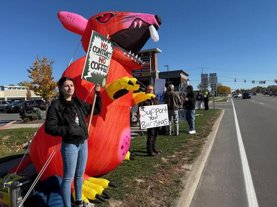Picketers stand in front of the Starbucks location on Sheridan Drive near Bailey in Amherst, Wednesday, Oct. 29, 2025. It was one of 70 pickets in 60 cities nationwide, as unionized Starbucks workers demand a contract with the coffee chain.