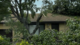 A Munster, Ind., home sits damaged in the aftermath of the severe storms that tore across Northwest Indiana on Aug. 11, 2026.