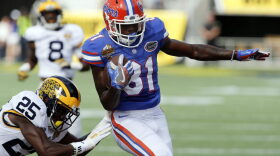 Florida Gators wide receiver Antonio Callaway (81) runs around Michigan Wolverines safety Dymonte Thomas (25) during the first quarter in the 2016 Citrus Bowl Jan 1, 2016 in Orlando, Fla. (Reinhold Matay/USA TODAY Sports)