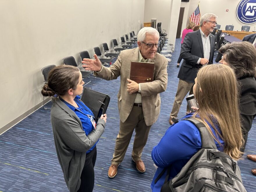 Former state Sen. Eddie Joe Williams talks with Arkansas Department of Corrections staff after being named interim secretary of corrections on Jan. 31, 2024.