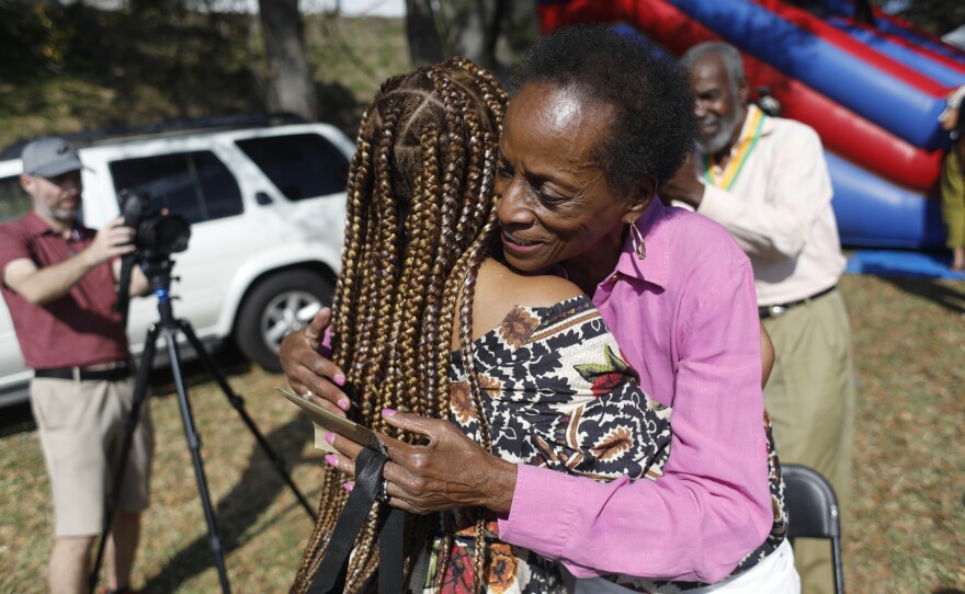 Gabrielle E. W. Carter greet festival attendees during the 2022 Publix Tampa Bay Collard Festival in St. Petersburg, Florida, on Saturday, February 19, 2022. Photo by Octavio Jones for WUSF