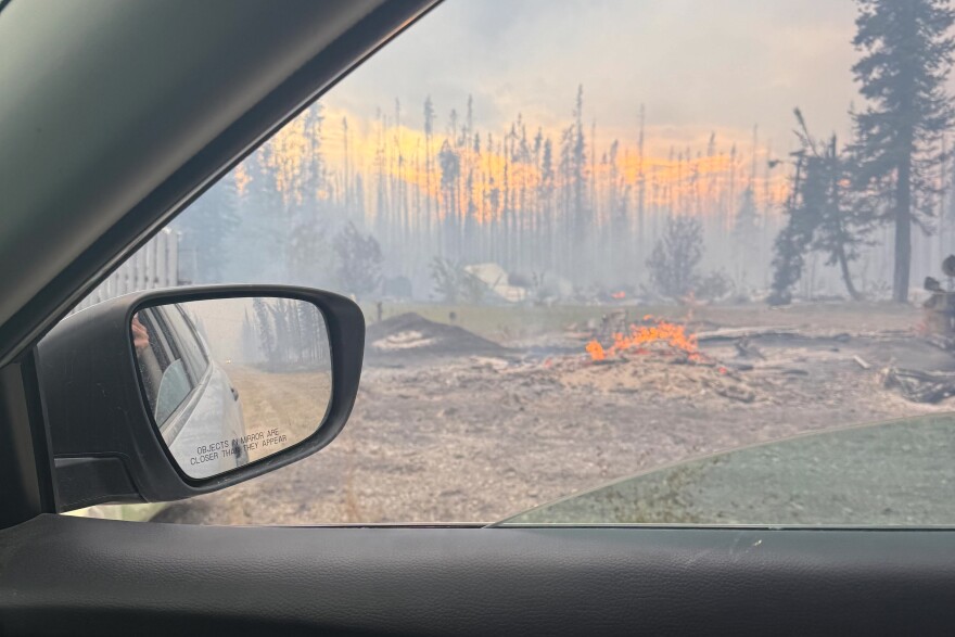 Tok resident Robert Nelson drives through his neighborhood on Aug. 18, 2026, the day after the Mukluk Fire started nearby.