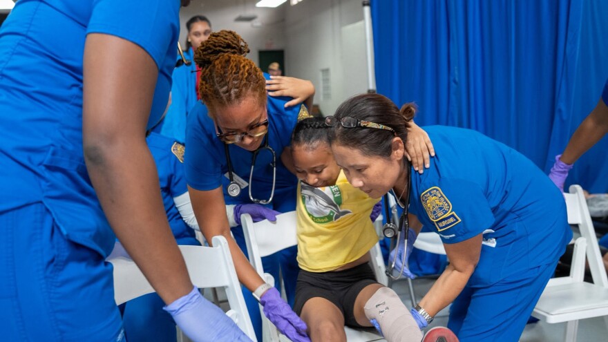 Pictured: Emergency responders participate in a full-scale pediatric disaster simulated exercise organized by the Virgin Islands Department of Health's EMS for Children Program.