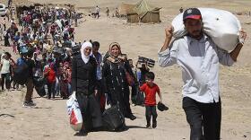 Syrian refugees relocating to Germany in first wave of temporary resettlement program.