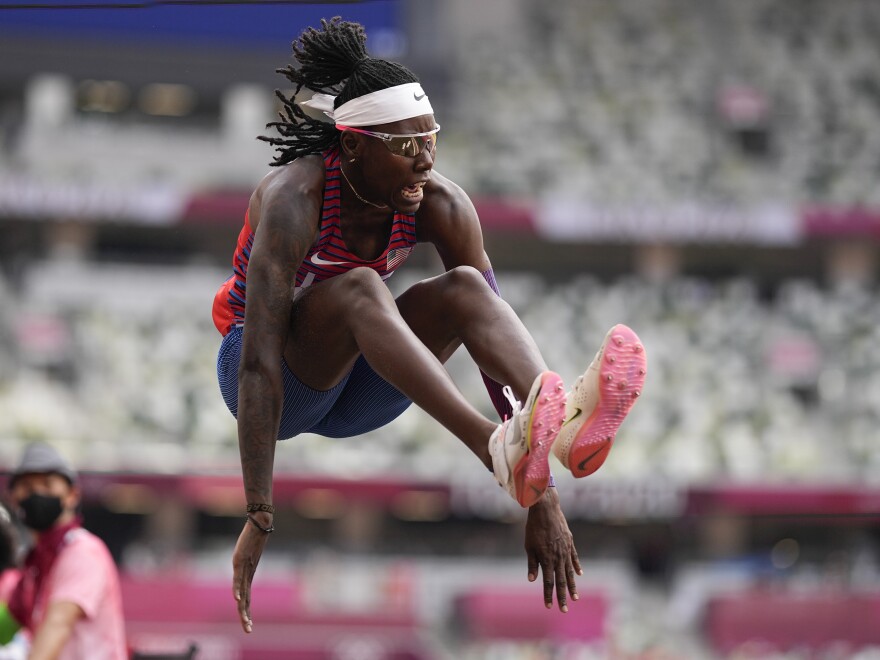 U.S. athlete Brittney Reese competes in the women's long jump final at the Summer Olympics in Tokyo.