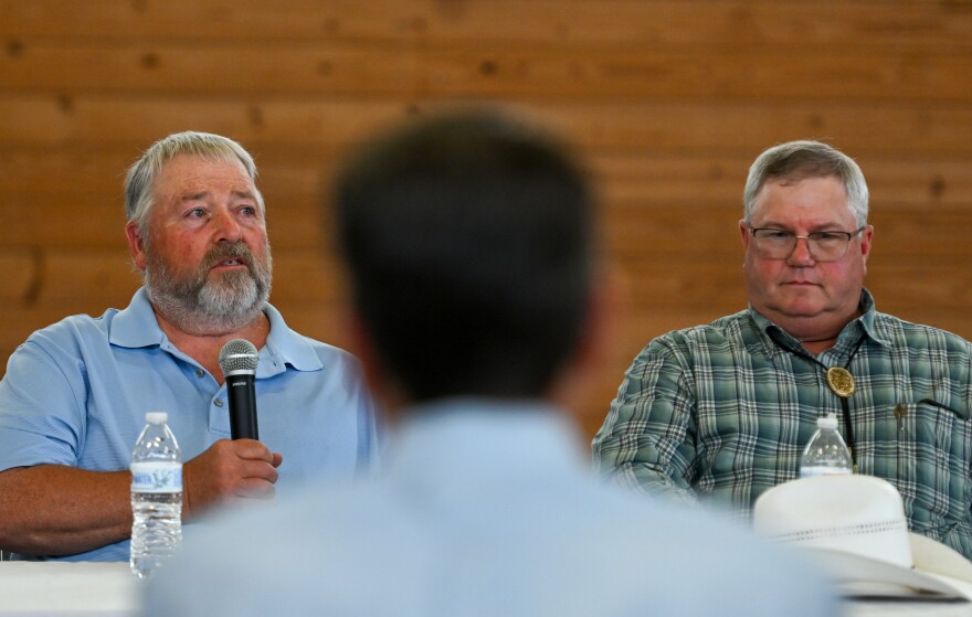 Farmer Jim Barbour, from Susquehanna County, discusses agriculture alongside farmer Tim Jaggers, from Wayne County.