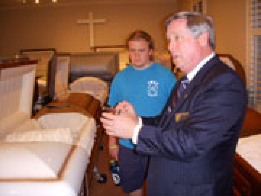 Members of the class listen to Cecil Burton, owner of Cecil M. Burton Funeral Home and Crematory in Shelby, NC