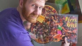 Brian Dwyer owns the world's largest collection of pizza-related items. He plans to display some of his memorabilia, including pizza-themed music records, in a new museum-restaurant in Philadelphia.