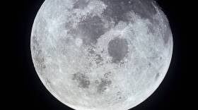 A view of the full moon photographed from the Apollo 11 spacecraft during its trans-Earth journey homeward. 
