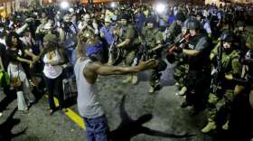 police-arrest-a-man-as-they-disperse-a-protest-wednesday-for-michael-brown-who-was-killed-by-police-aug-9-in-ferguson-mo