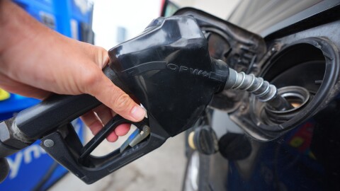 Gas is topped off after filling up a vehicle's fuel tank in the Dallas suburb of Richardson, Texas, Wednesday, May 6, 2026. (AP Photo/LM Otero)
