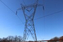 Transmission lines already crisscross the state, including this one down the road from Darren Blanchard's property in Mounds.