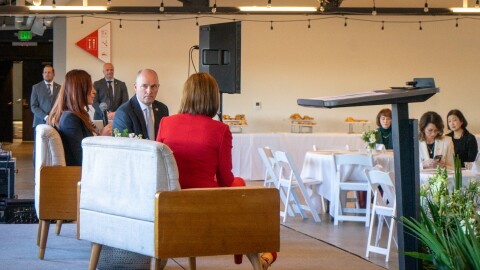 Utah Gov. Spencer Cox and Kirsten Baesler with the U.S. Department of Education speak on a panel at the governor’s Literacy and Reading Symposium in Ogden, Jan. 6, 2026. KSL News anchor Deanie Wimmer moderates the conversations.