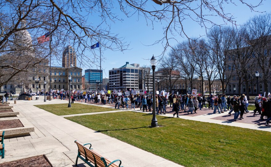 Thousands gathered at the Michigan Capitol in Lansing, Mich., on March 28, 2026, for a No Kings rally.