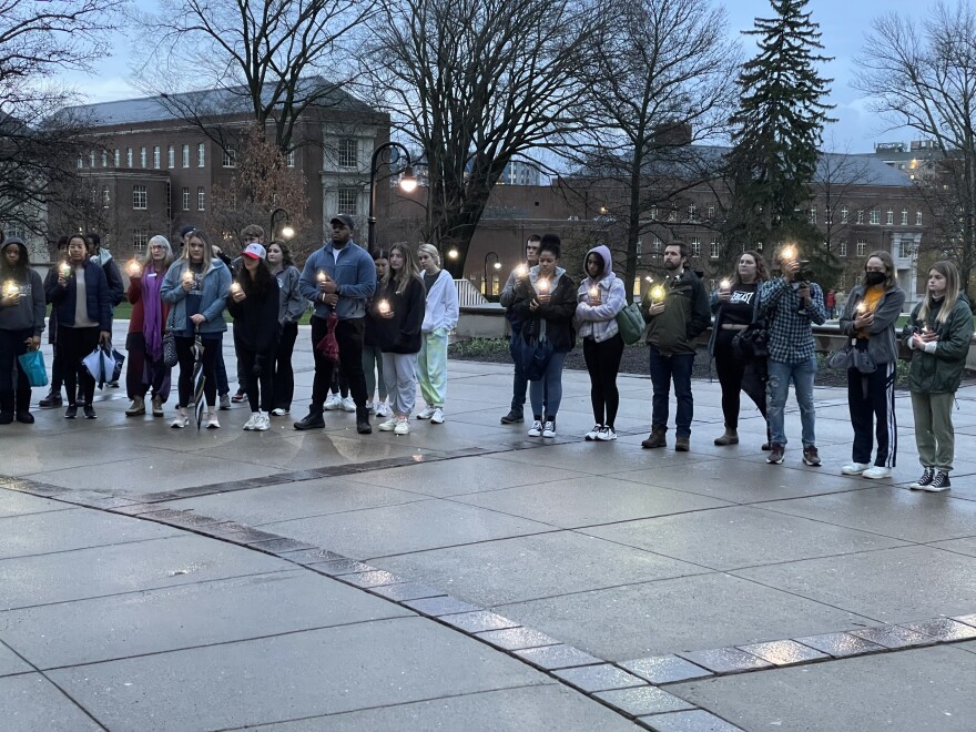 Students gathered at the bottom of the Old Main steps toward the end of the rally to provide a makeshift candlelight vigil to those who didn't survive their sexual assault cases. Two students read poems about their experience during the ceremony.