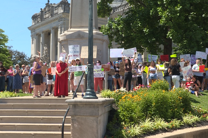 People gathered downtown at the Monroe County Courthouse Monday.