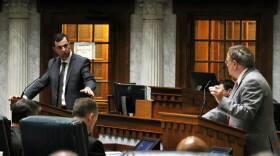 Sen. Fady Qaddoura (D-Indianapolis), left, and Sen. Mike Young (R-Indianapolis) debate Young's proposal to eliminate rape and incest exceptions for abortion during a Senate floor session on July 28, 2022.