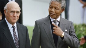 Nelson Mandela with South African President F.W. de Klerk in May 1990. Mandela died Thursday at 95.