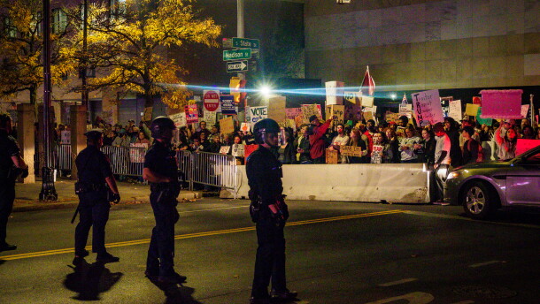 As President Trump took center stage in Syracuse's OnCenter, hundreds of protestors were met with a police barricade outside the venue.