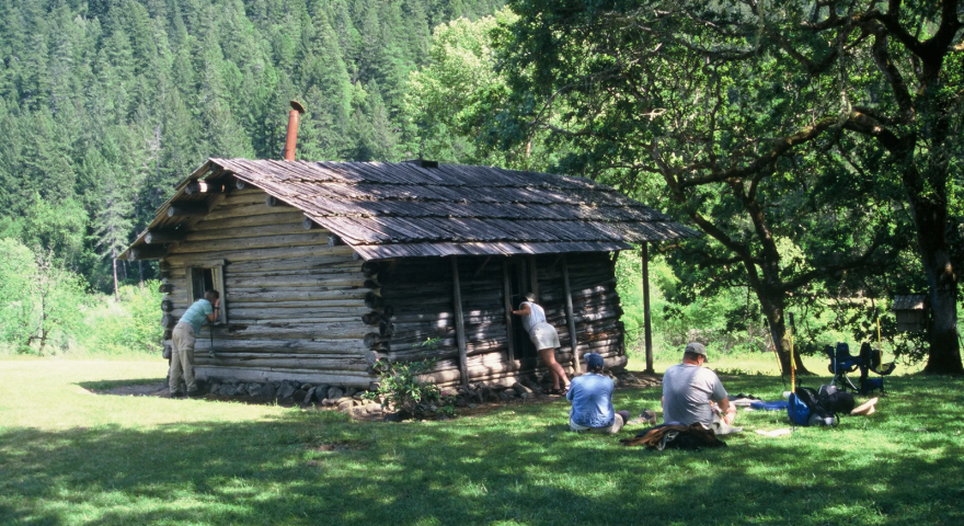 Curiosity seekers visit Zane Gray's cabin at Winkle Bar, which has been added to the Oregon registry of historic places.
