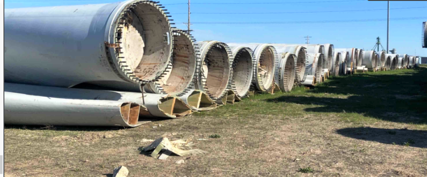 State environmental officials are asking the attorney general to investigate a Washington state-based company that has failed to recycle old wind turbine blades stored in Newton, Ellsworth and Atlantic.