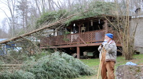 Grady Langley takes a moment to rest while clearing debris from his yard on Friday, Feb. 7, 2025. Langley and his wife sheltered in their home Thursday night when an EF2 tornado twisted through Morgan County, killing two and injuring three others.