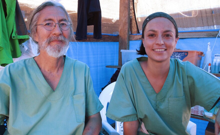 Dr. Cedric Yoshimoto of Volcano, Hawaii, and Dr. Citlali Barba of Mexico City cared for both Edwin Koryan and his granddaughter Komasa at the Ebola treatment center run by Doctors Without Borders in Foya, Liberia.