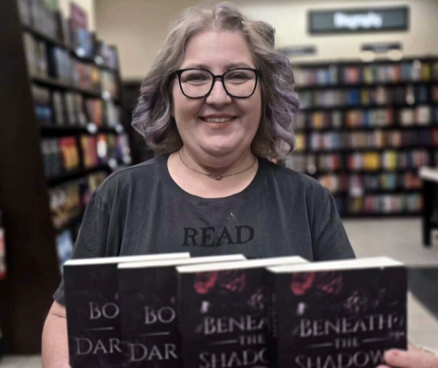 Tara Conrad, author of "Her Surrender" and other dark romance novels, is one of the organizers of Electric City Love Con.