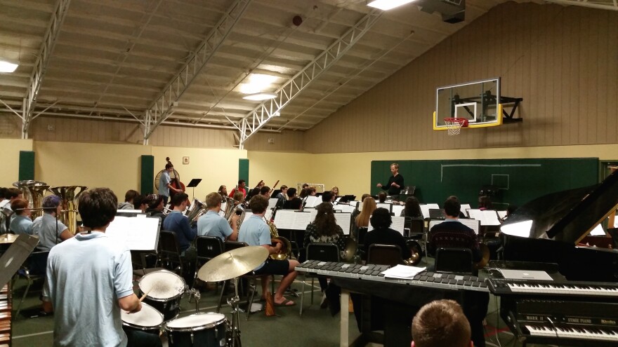 Interlochen Arts Academy Band Director Matt Schlomer leads his band in rehearsal.