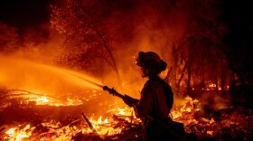 A firefighter at the Fawn Fire.