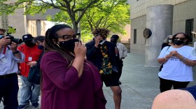 Keren Prescott stands outside Hartford Superior Court last month. Prescott's lawyer, Ken Krayeske, says ideally the case against Yuliya Gilshteyn would end in a conviction and not accelerated rehabilitation. 