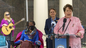 Rev. Sara Smith, to her right is John Brannelly, who works on the flag raising and the lady sitting down is Josephine Thomas, a moderator of the LGBT and allies club at central high school in Bridgeport.