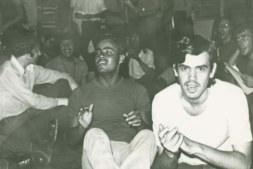 Gay activists gather at a New York City YMCA in August 1971 to protest discriminatory policies against gay men.